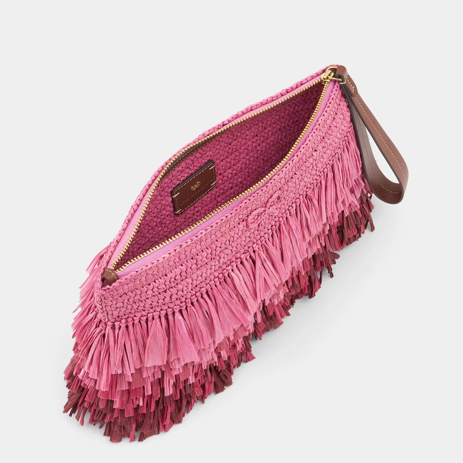 Anya Hindmarch Bow Clutch Shag in Bubblegum Raffia
