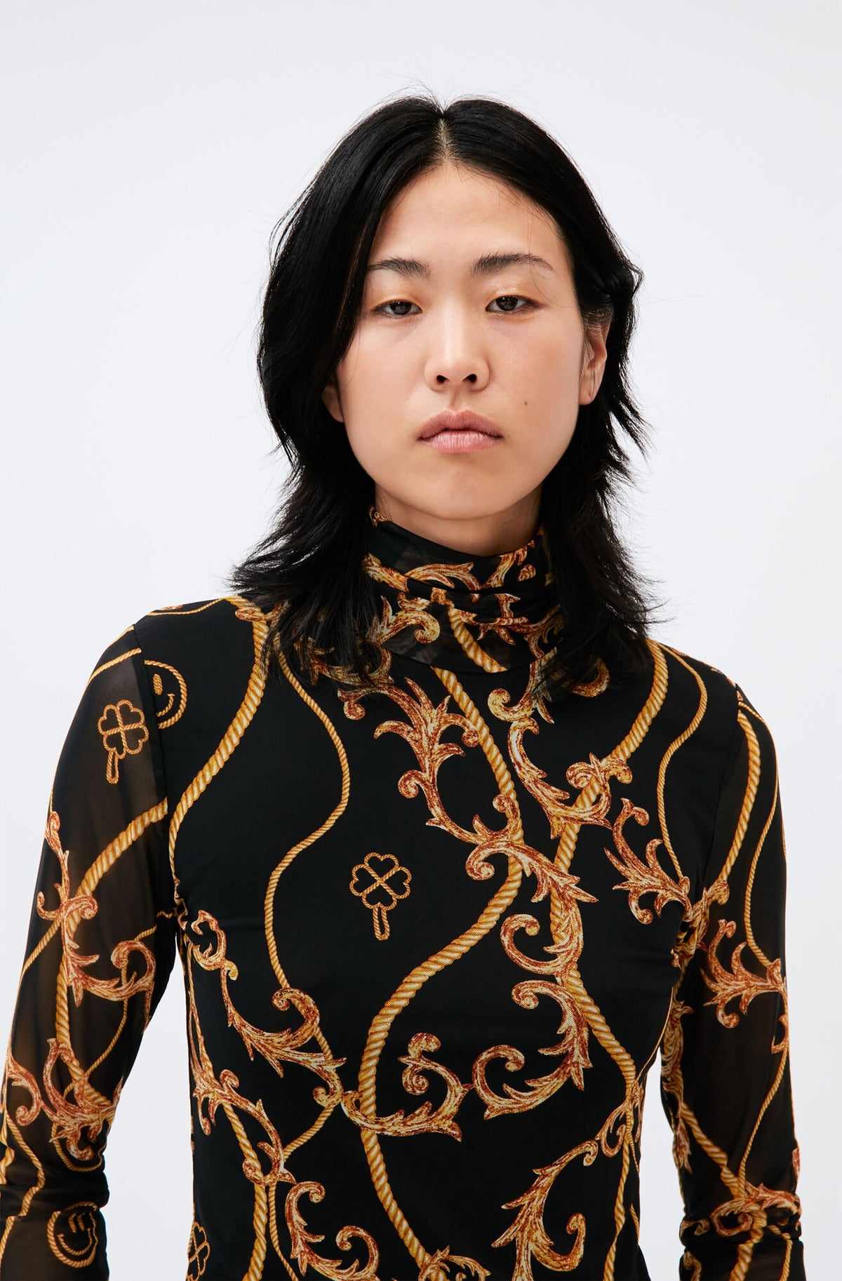 Ganni T2998 ornate-print roll-neck top