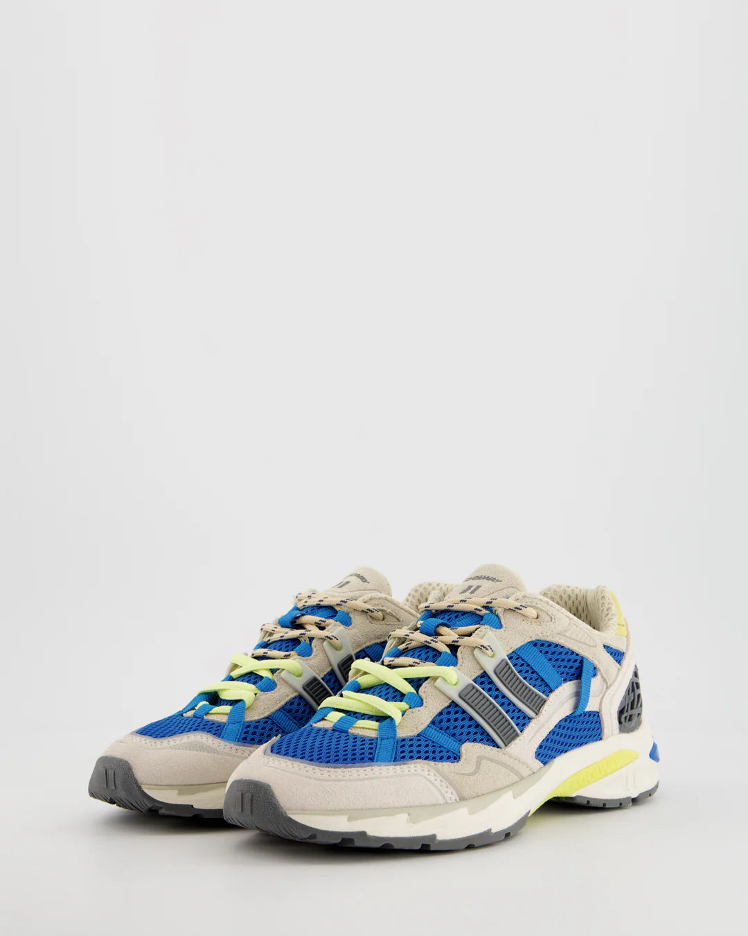 Retro-inspired with a modern edge, the Coolway 2003 Sneakers in Blue