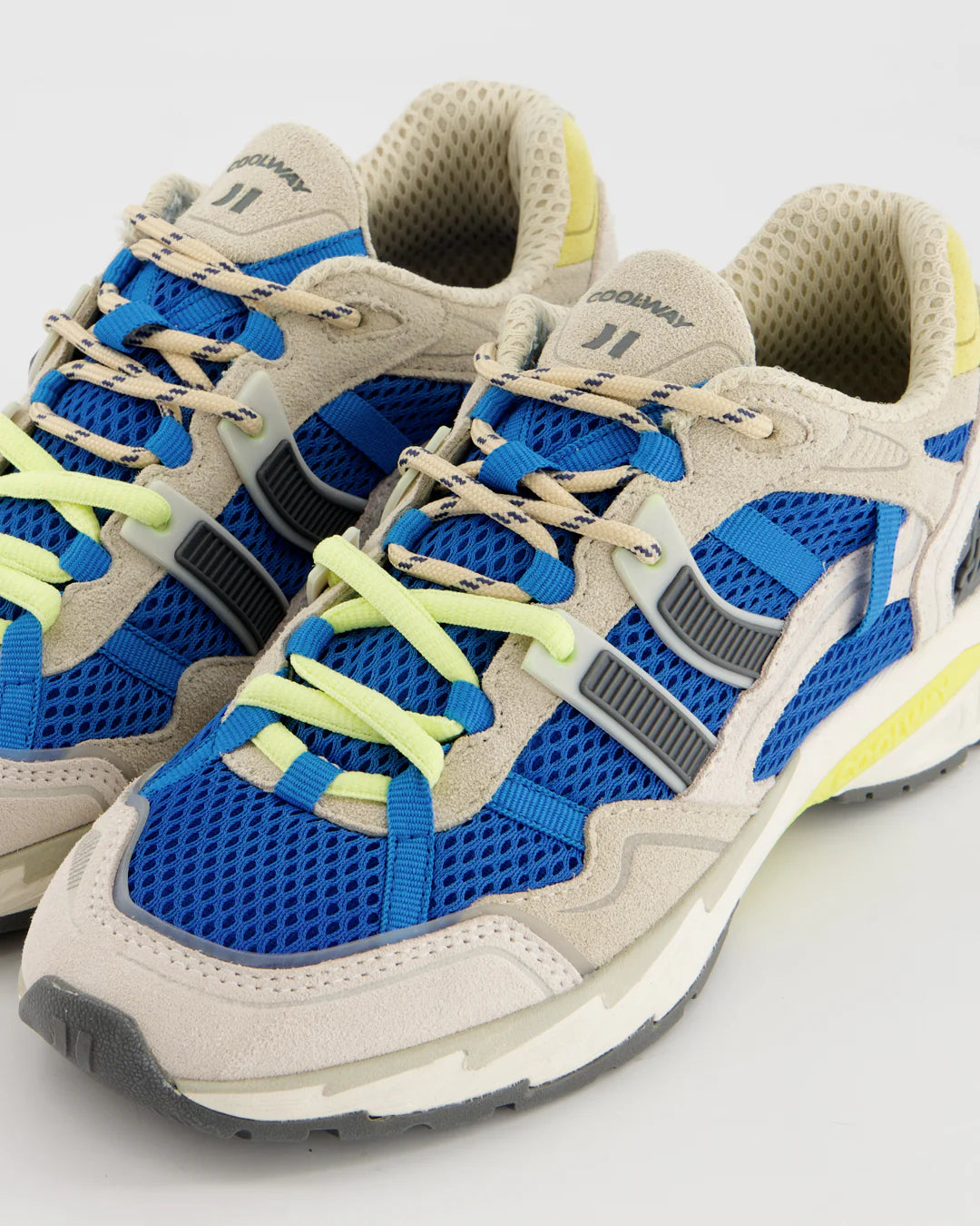 Retro-inspired with a modern edge, the Coolway 2003 Sneakers in Blue