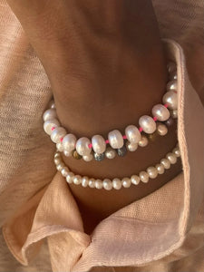 You added <b><u>BON BON Fine Freshwater Pearl Bracelet, Neon Pink Thread</u></b> to your cart.