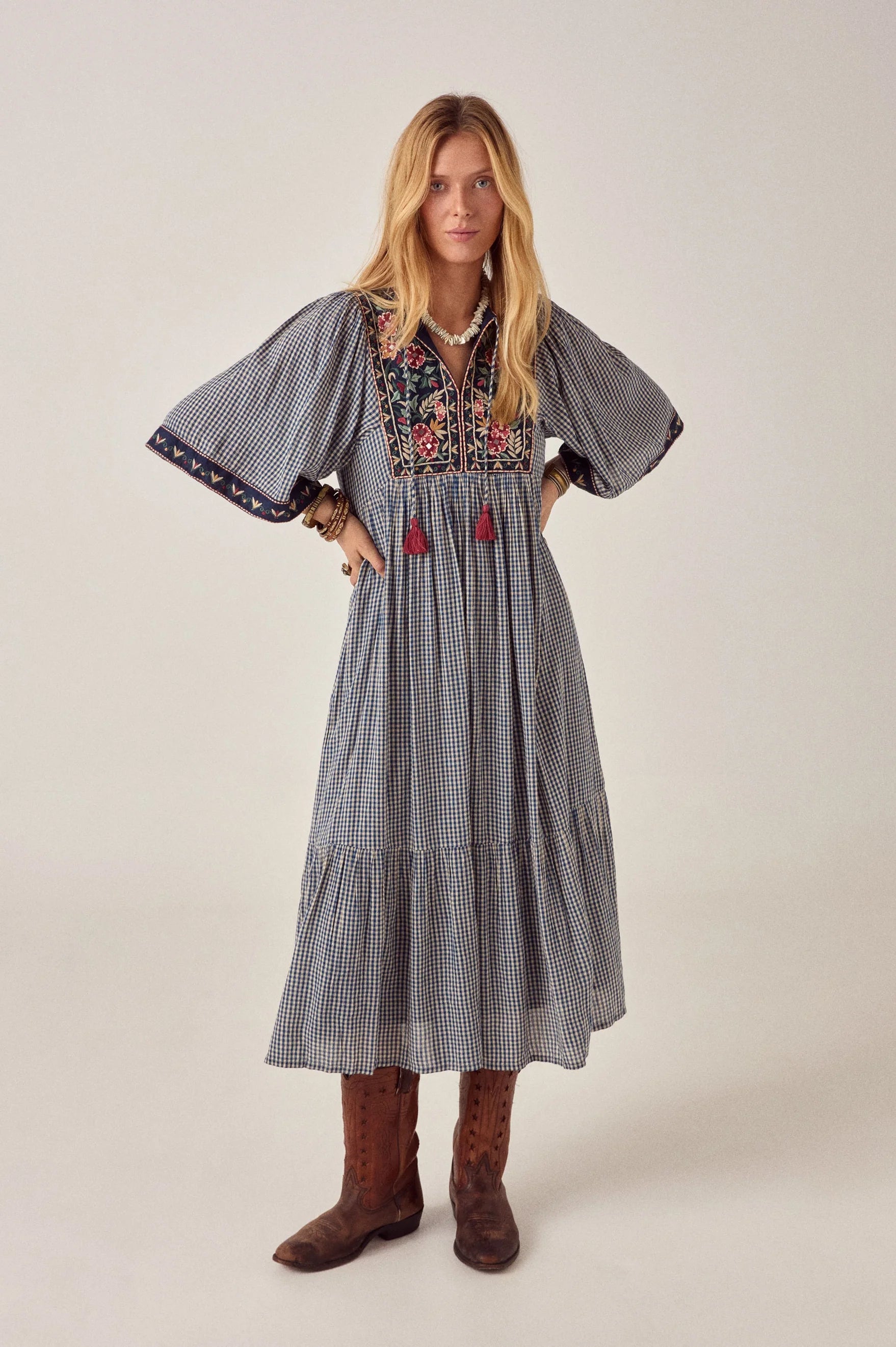 Maison Hotel Augusta Gingham Bloom Dress in Picnic Blue is a midi cotton gingham dress with statement embroidery.