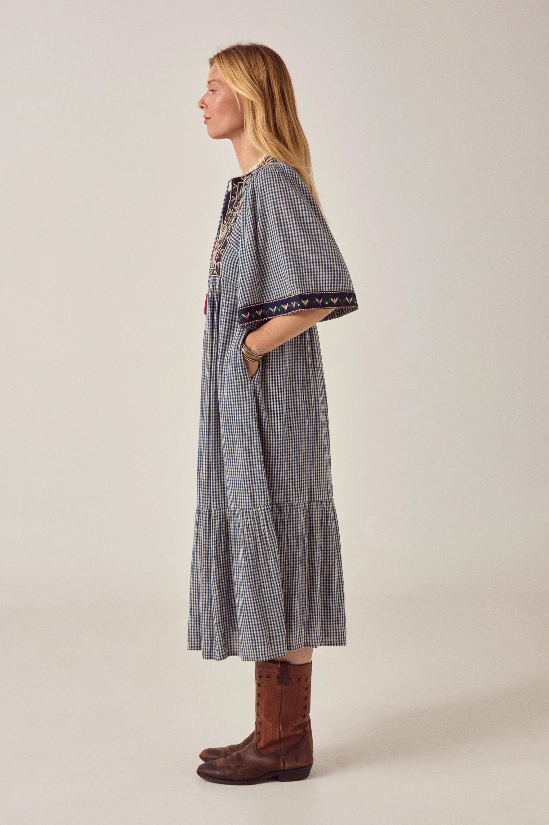 Maison Hotel Augusta Gingham Bloom Dress in Picnic Blue is a midi cotton gingham dress with statement embroidery.