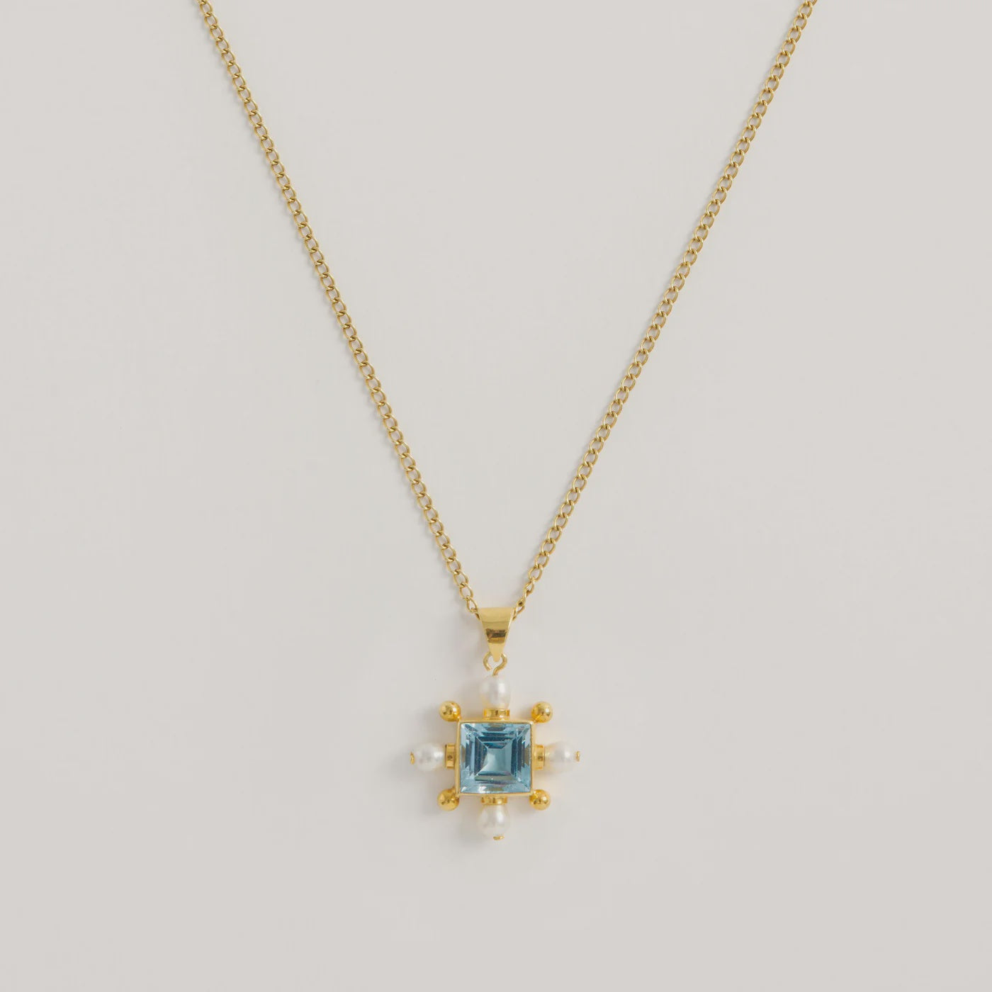 Freya Rose Blue Topaz Cross Necklace
