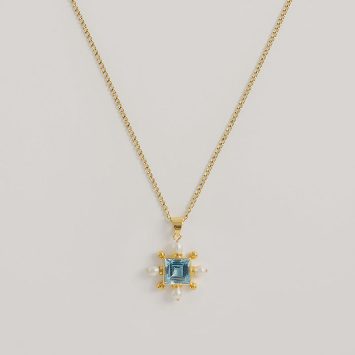 Freya Rose Blue Topaz Cross Necklace