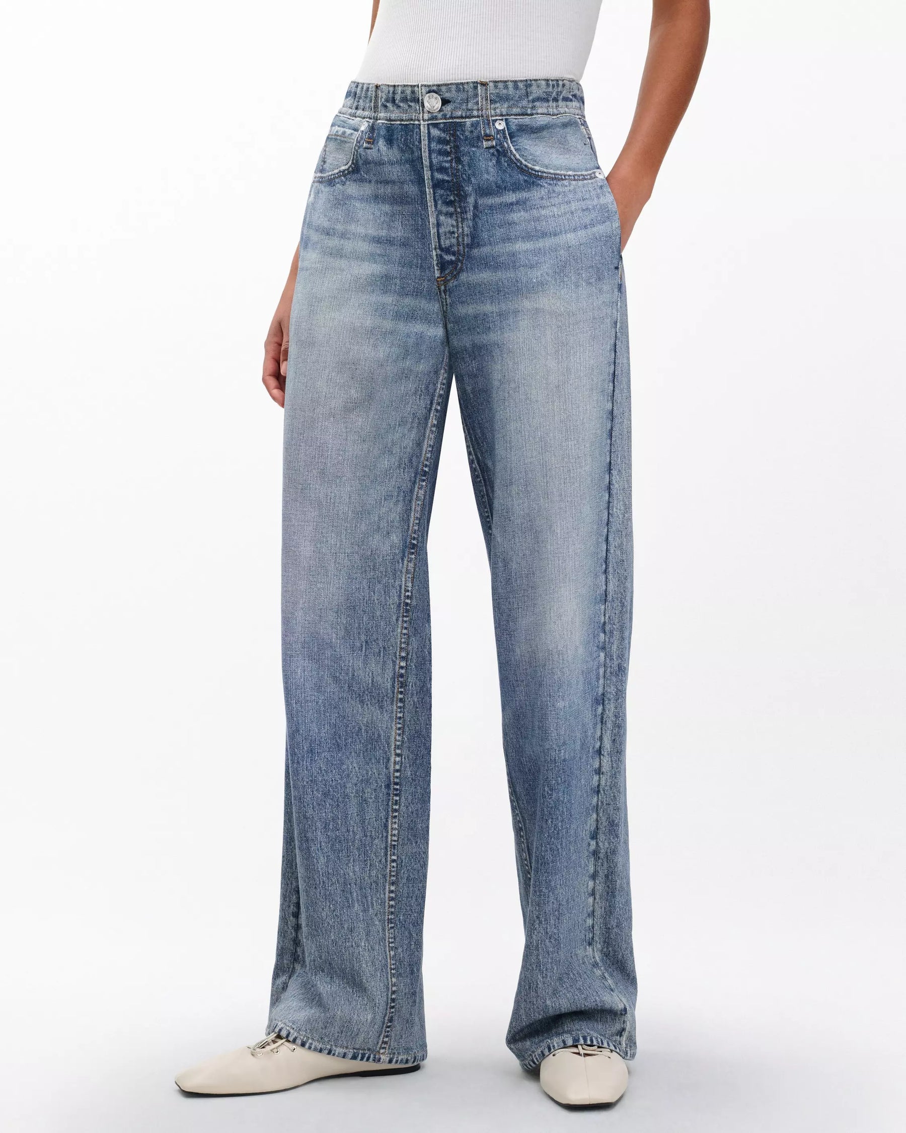 Rag & Bone Miramar Terry Wide Leg in Scarlet Light blue jeans worn by a person on a white background