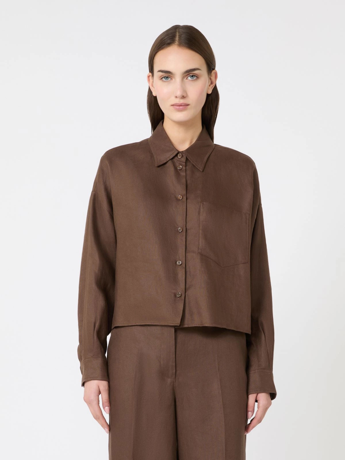 ANNA Weekend Maxmara Capo Linen Shirt in ChocolateWoman wearing a brown shirt and pants on a white background
