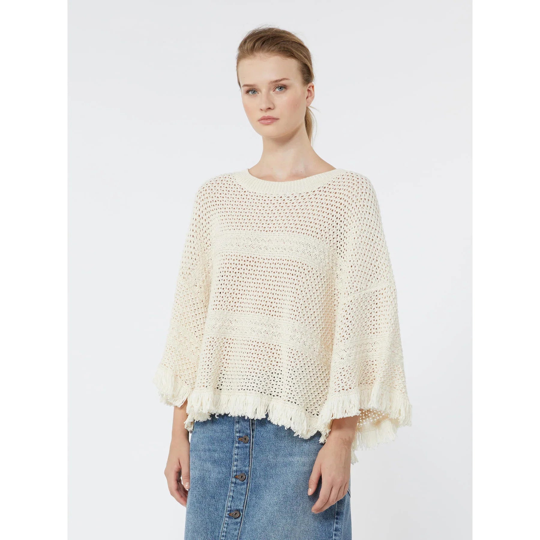 Weekend Maxmara Palato Knitted Top in Ecru Woman wearing a cream knitted sweater and blue jeans on a white background