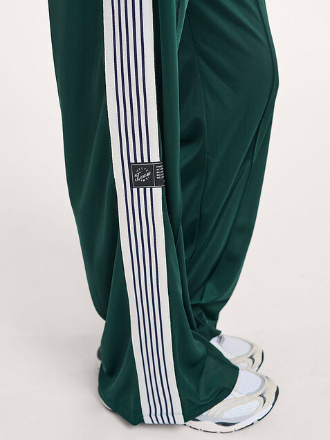 Haute L'Amitié Baggy Track Pants in Sporty Green