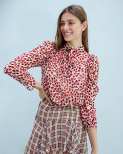 You added <b><u>M Jadyn printed top in red</u></b> to your cart.
