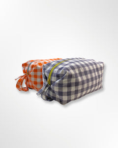 You added <b><u>NOOKI Gingham Washbag in Black</u></b> to your cart.